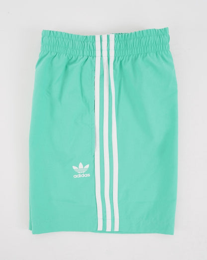 Adidas Originals – Badeshorts mit 3 Streifen in Hi-Res-Grün