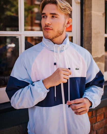 Lacoste Windbreaker mit Brustpaneel Himmelblau/Marineblau/Pink