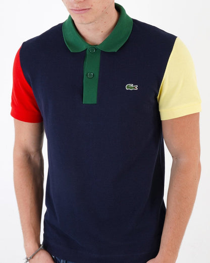 Lacoste – Poloshirt mit kontrastierendem Farbblockdesign in Marineblau