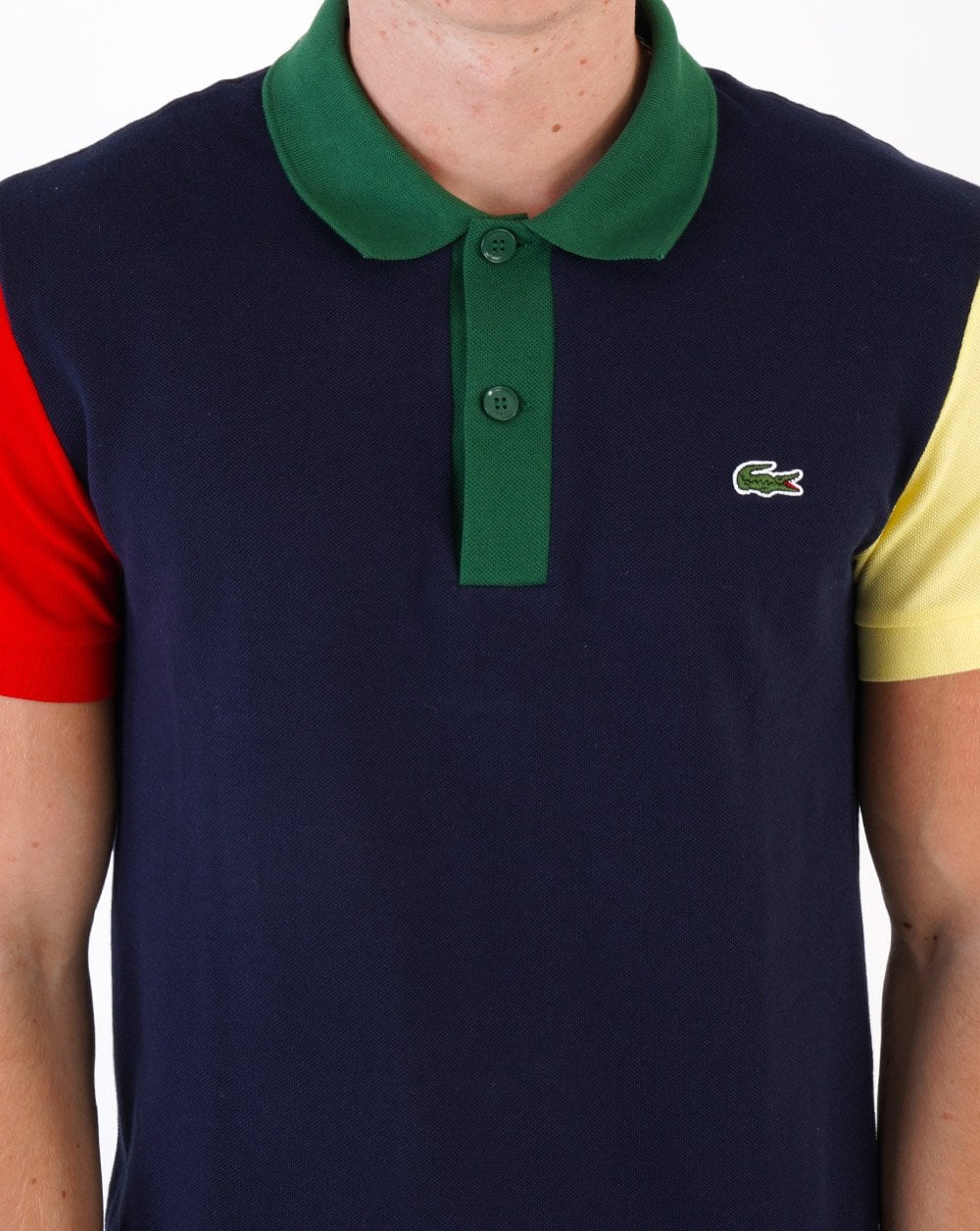 Lacoste – Poloshirt mit kontrastierendem Farbblockdesign in Marineblau