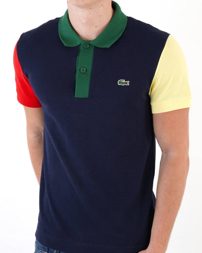 Lacoste – Poloshirt mit kontrastierendem Farbblockdesign in Marineblau