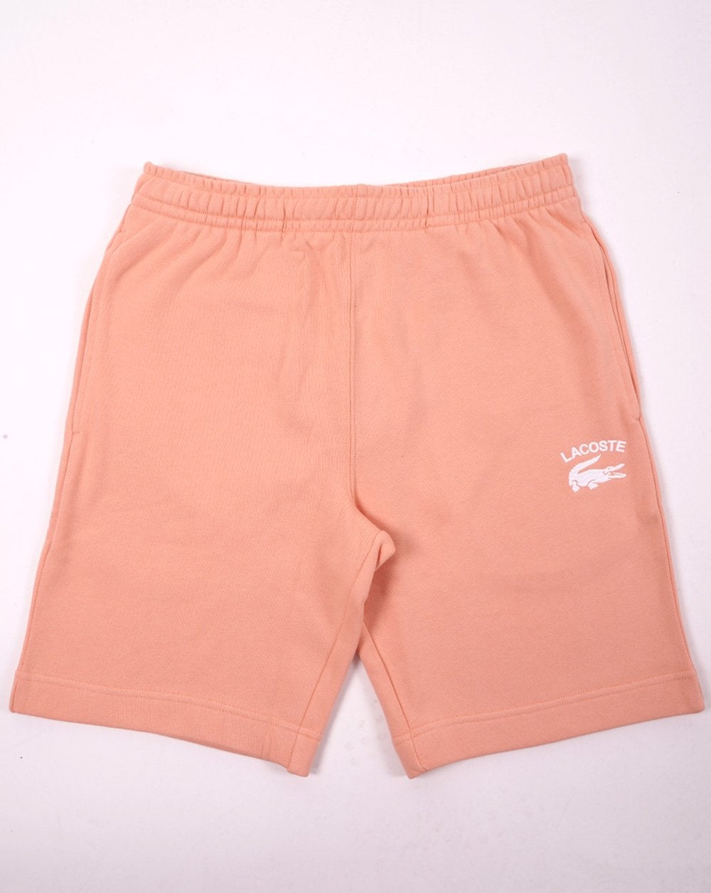 Lacoste – Bestickte Fleece-Shorts in Pfirsich