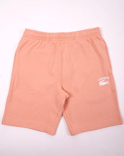 Lacoste – Bestickte Fleece-Shorts in Pfirsich