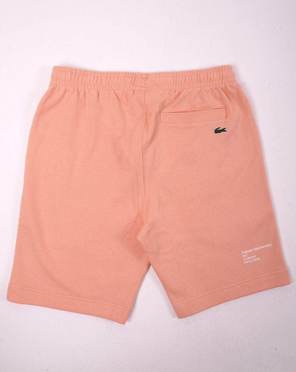 Lacoste – Bestickte Fleece-Shorts in Pfirsich
