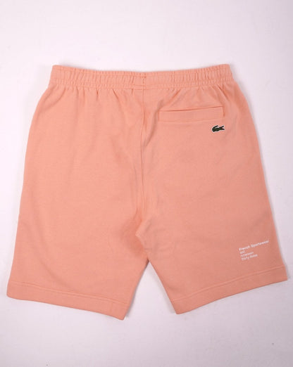 Lacoste – Bestickte Fleece-Shorts in Pfirsich