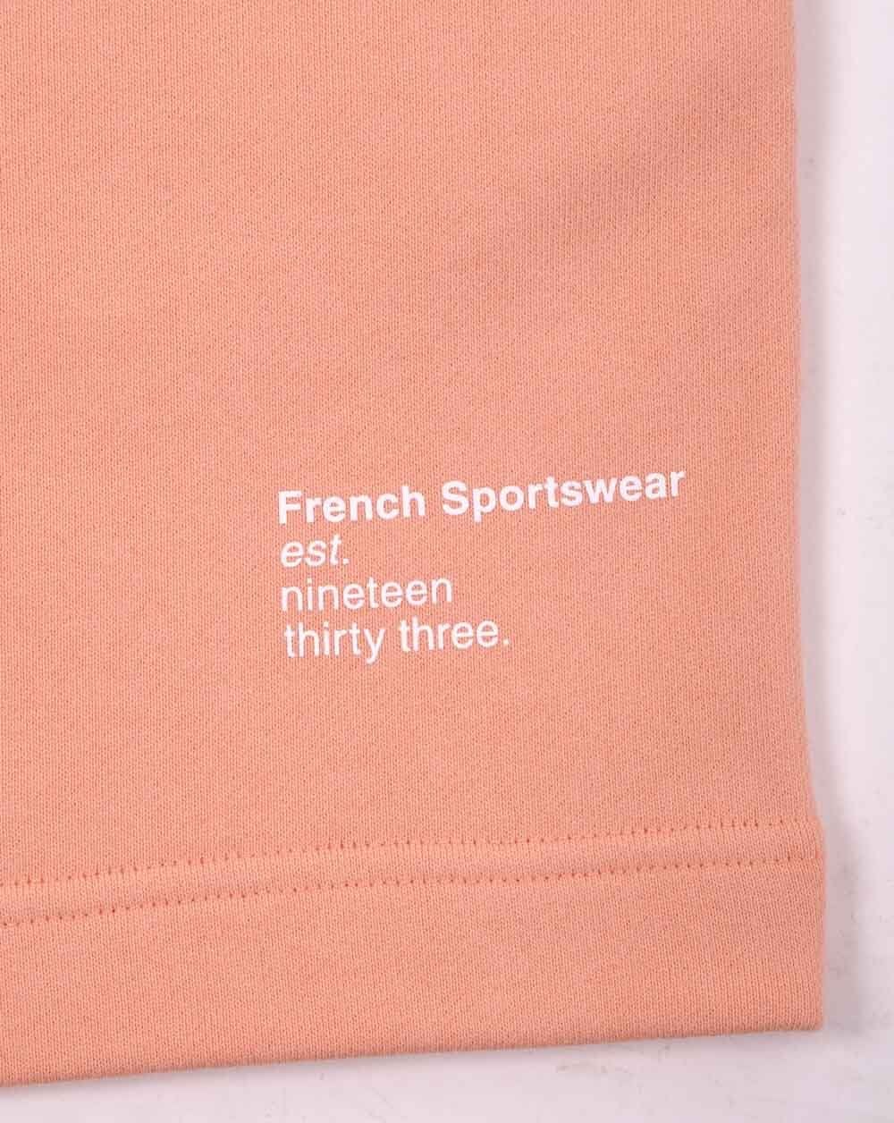 Lacoste – Bestickte Fleece-Shorts in Pfirsich
