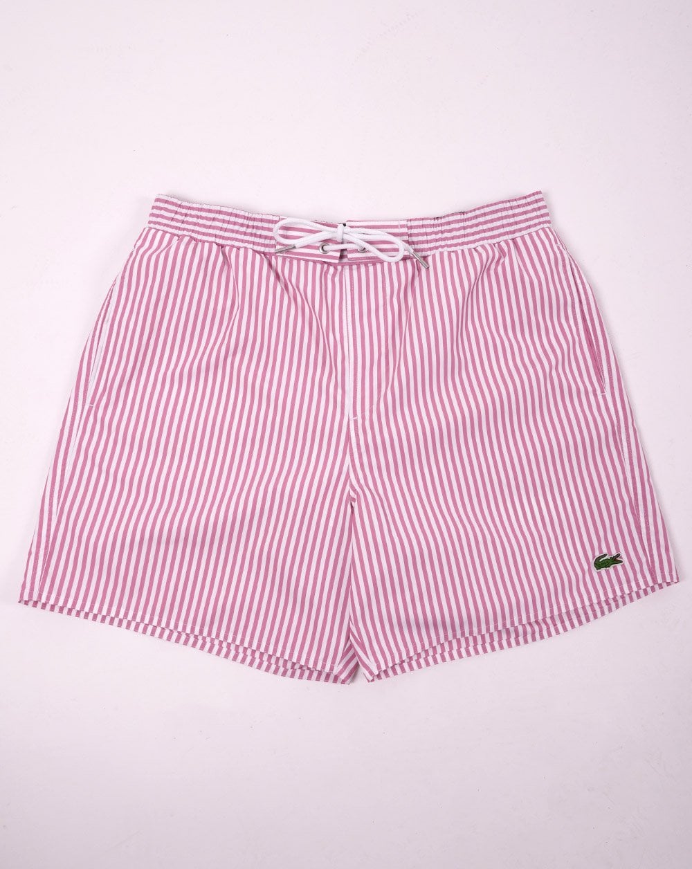 Lacoste – Gestreifte Badeshorts Rosa/Weiß