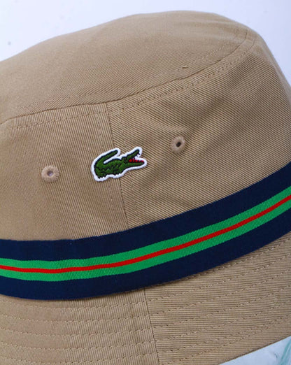 Lacoste – Gestreifter Fischerhut, dunkler Sand