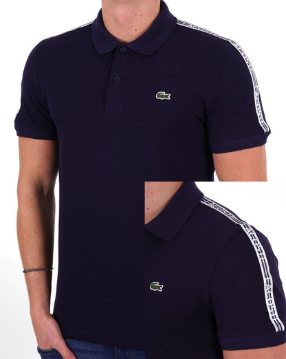Lacoste – Piqué-Poloshirt mit Taping in Marineblau