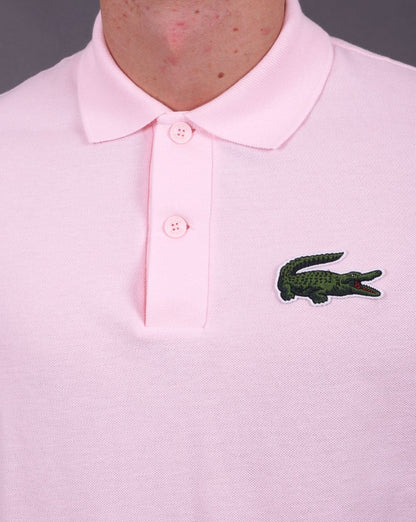 Lacoste – Großes Krokodil-Poloshirt in Rosa