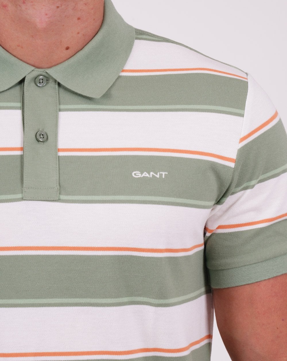 Gant – Piqué-Poloshirt mit mehreren Streifen in Grün