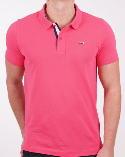 Tommy Jeans – Poloshirt mit Signatur-Knopfleiste in Hot Pink