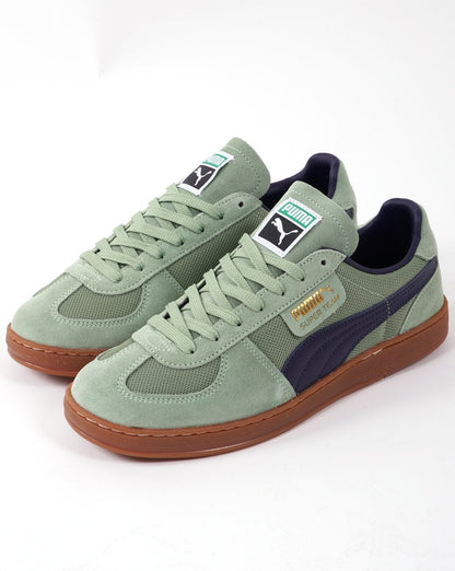 Puma Super Team OG Trainer Staubgrün/Marineblau