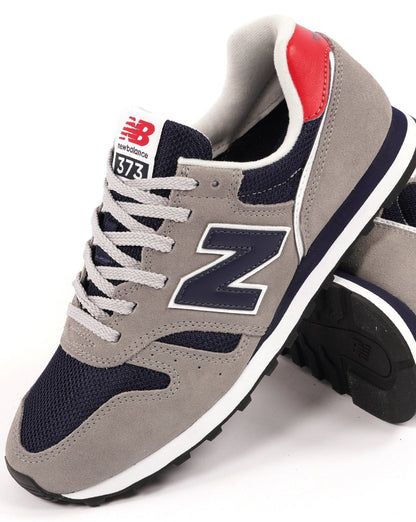 New Balance 373 Trainer Grau/Marineblau