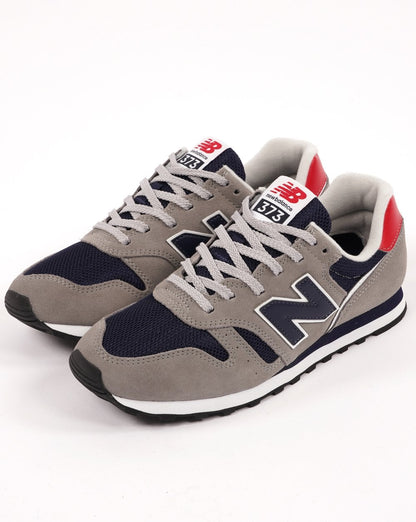 New Balance 373 Trainer Grau/Marineblau