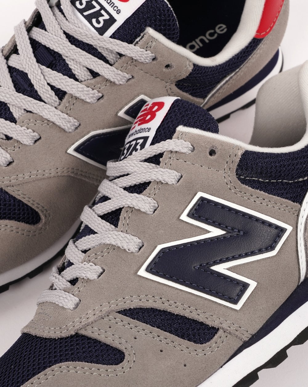 New Balance 373 Trainer Grau/Marineblau