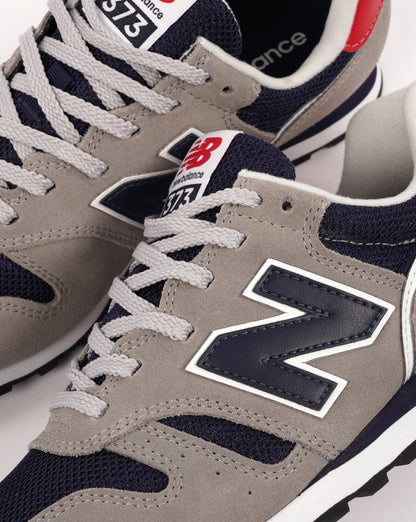 New Balance 373 Trainer Grau/Marineblau