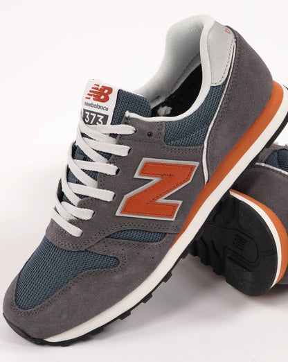 New Balance 373 Trainer Dunkelgrau/Orange