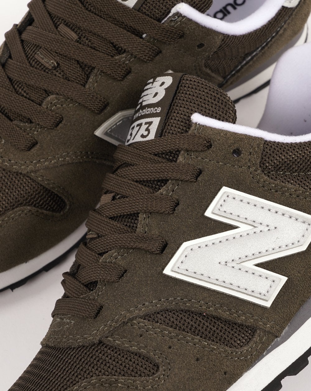 New Balance 373 Trainer Dunkelkhaki/Silber