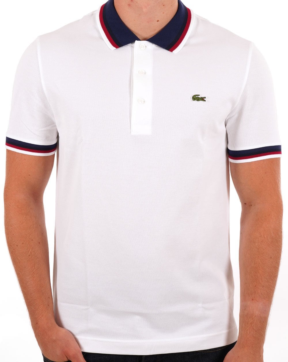 Lacoste – Poloshirt mit Kontrastkragen in Weiß