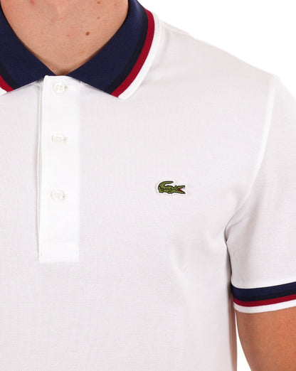Lacoste – Poloshirt mit Kontrastkragen in Weiß