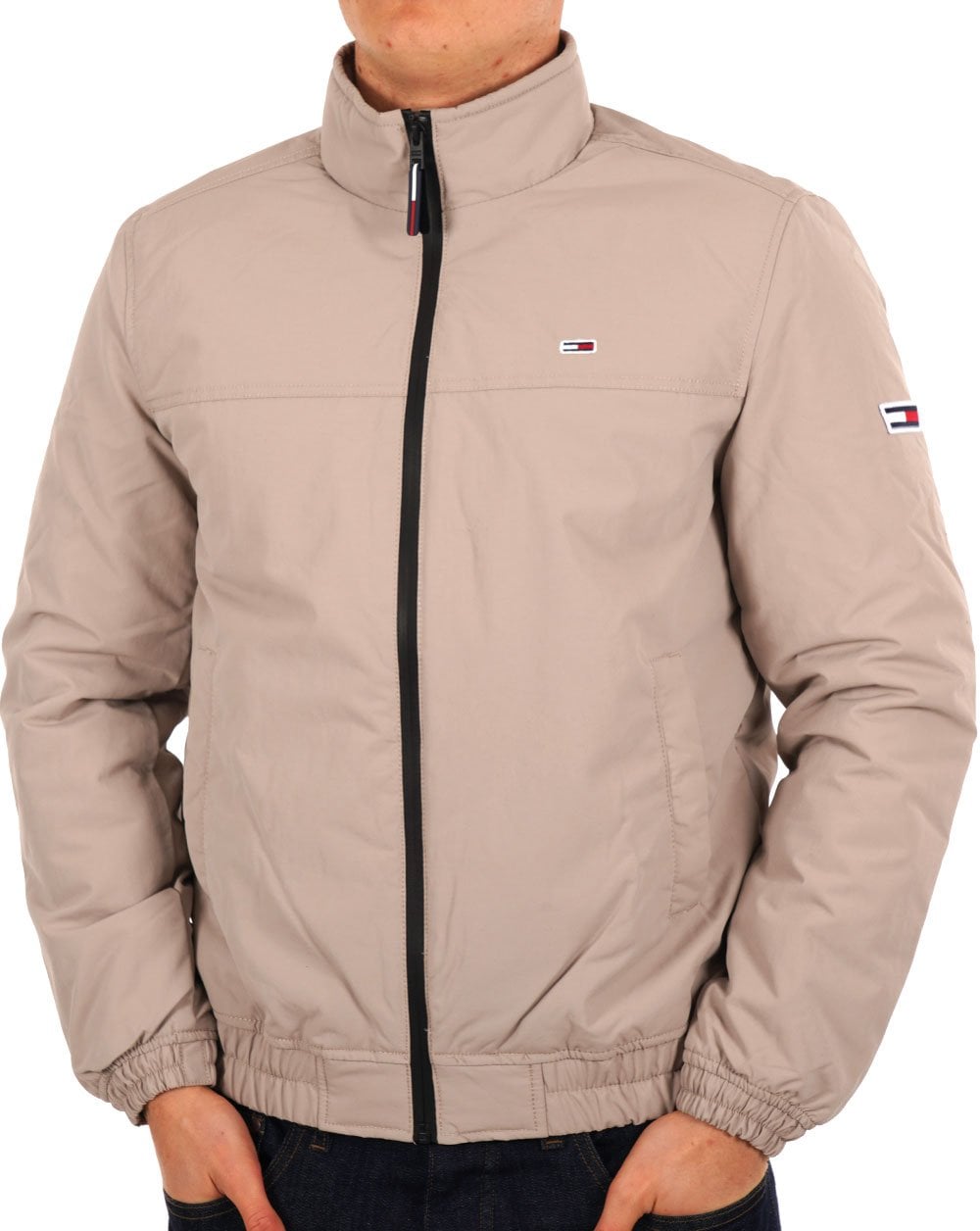 Tommy Jeans – Wattierte Bomberjacke in Stein
