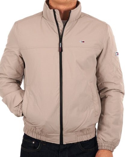 Tommy Jeans – Wattierte Bomberjacke in Stein
