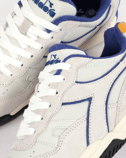 Diadora Winner Games Trainer Weiß/Marineblau/Gold