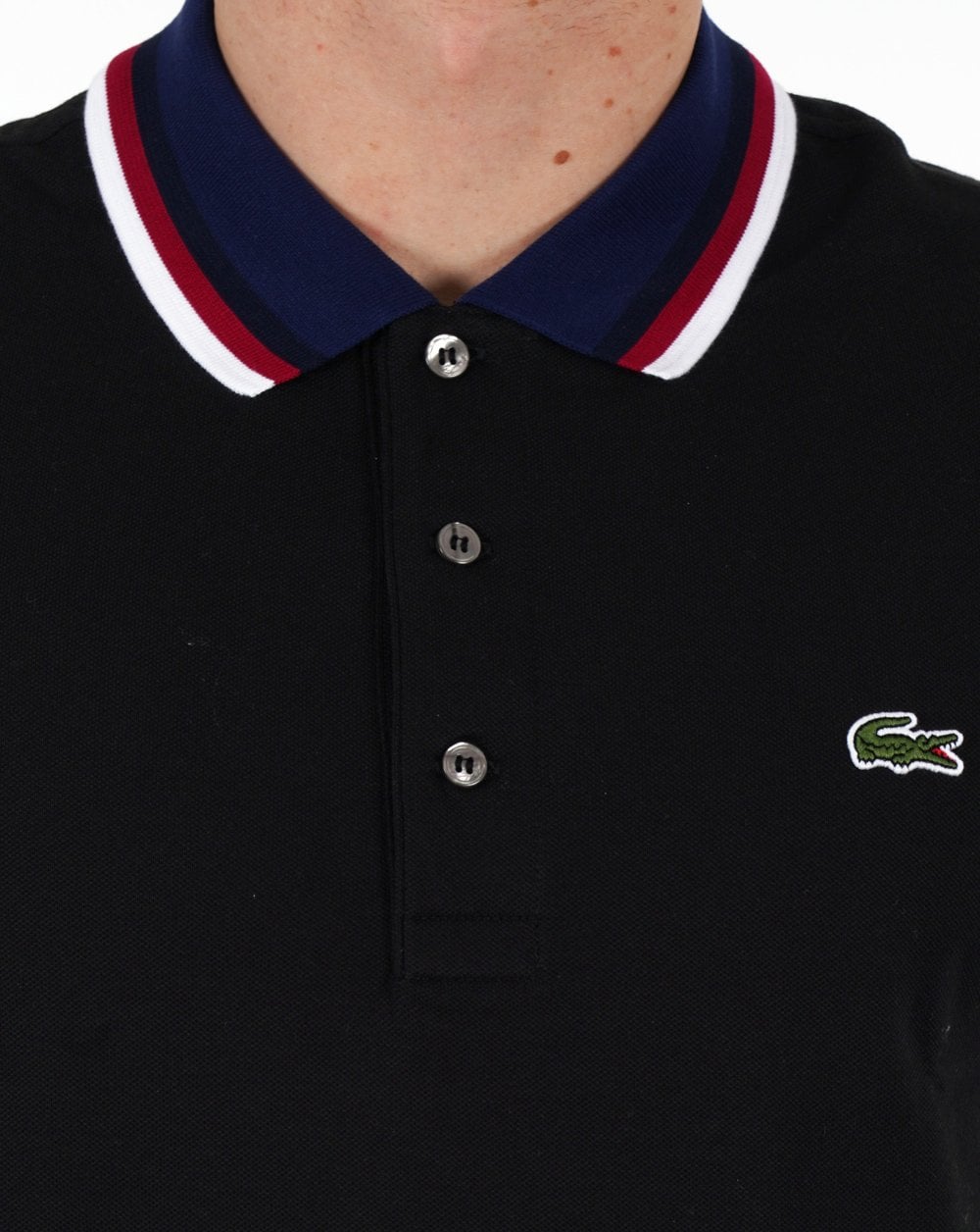 Lacoste – Poloshirt mit Kontrastkragen in Schwarz