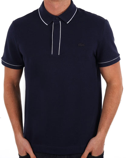 Lacoste – Poloshirt mit Streifen in Marineblau