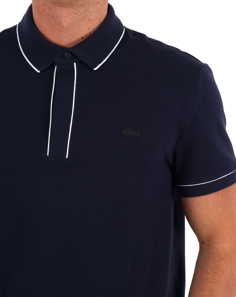 Lacoste – Poloshirt mit Streifen in Marineblau