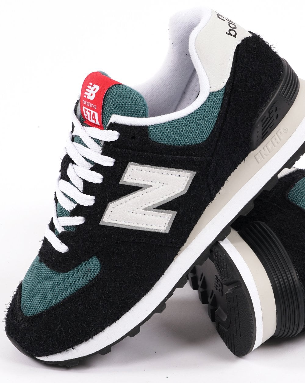New Balance 574 Trainer Schwarz/Blau