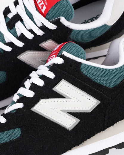 New Balance 574 Trainer Schwarz/Blau