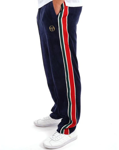 Sergio Tacchini – Gestreifte Trainingshose aus Velours im 70er-Stil, Marineblau