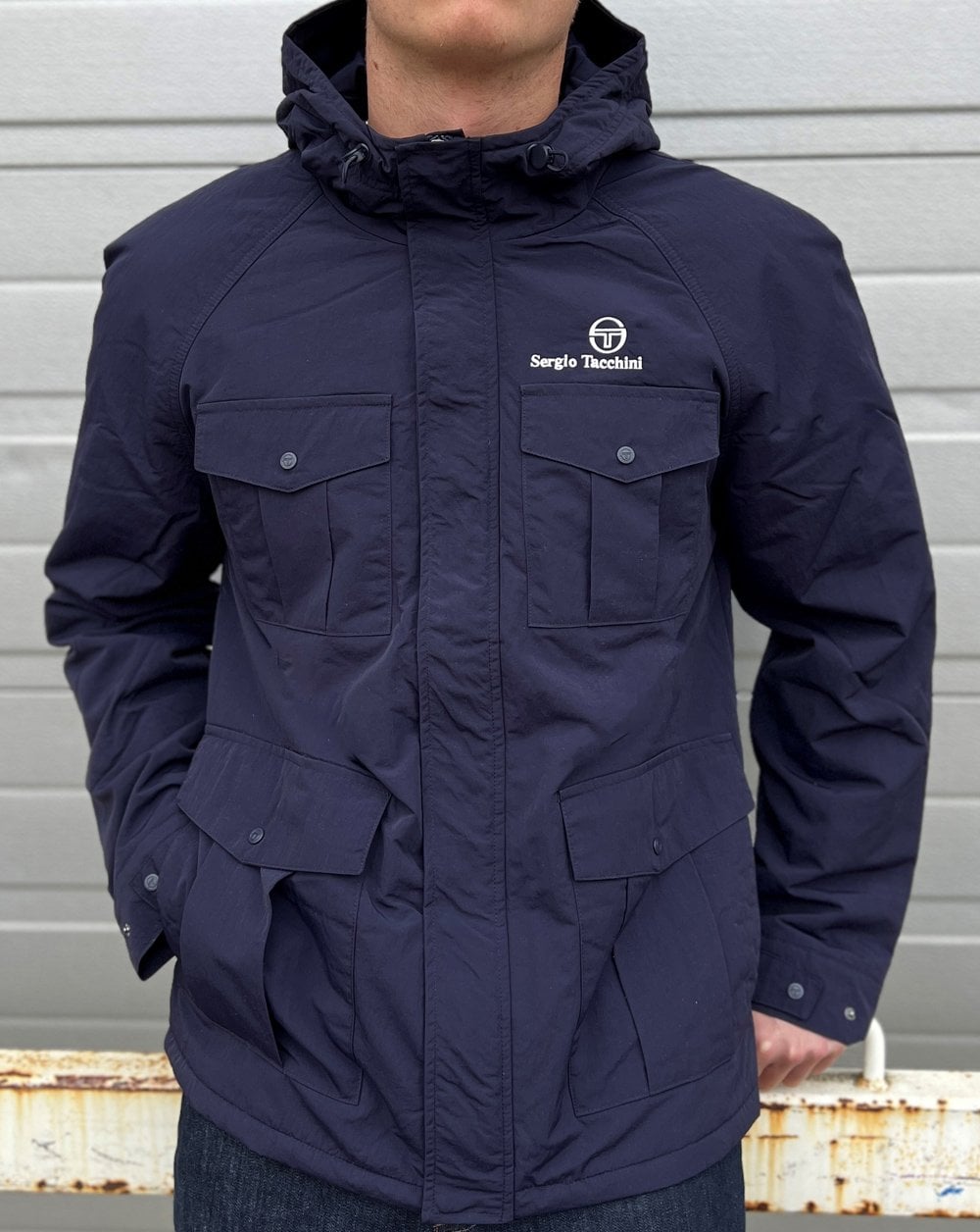 Sergio Tacchini – Gefütterte Taschenjacke in Marineblau