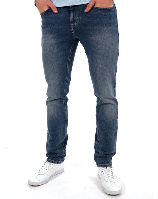 Tommy Hilfiger Tommy Jeans – Scanton – Schmal geschnittene Jeans in mittlerer Waschung