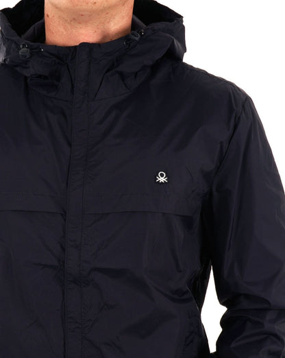 Benetton – Regenschutzjacke mit Kapuze in Marineblau