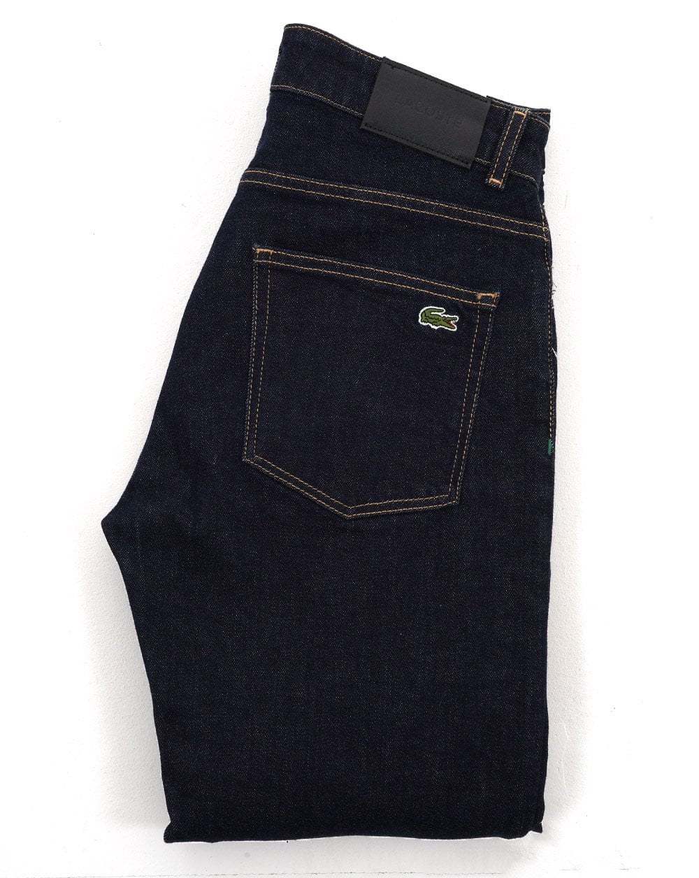 Lacoste – Slim Fit – Indigoblaue Jeans mit verwaschener Spülung