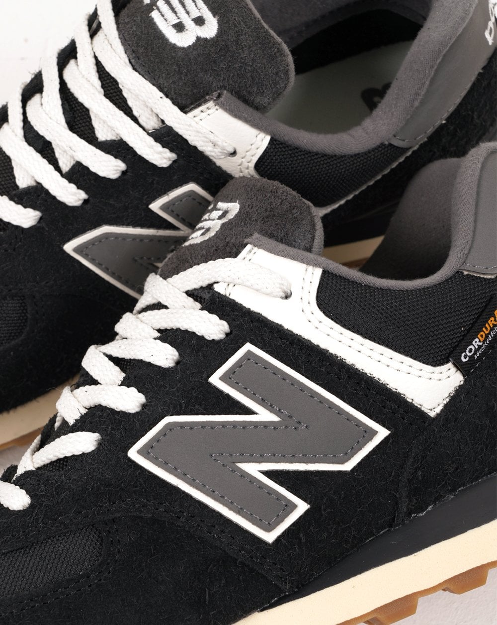New Balance 574 Trainer Schwarz/Grau