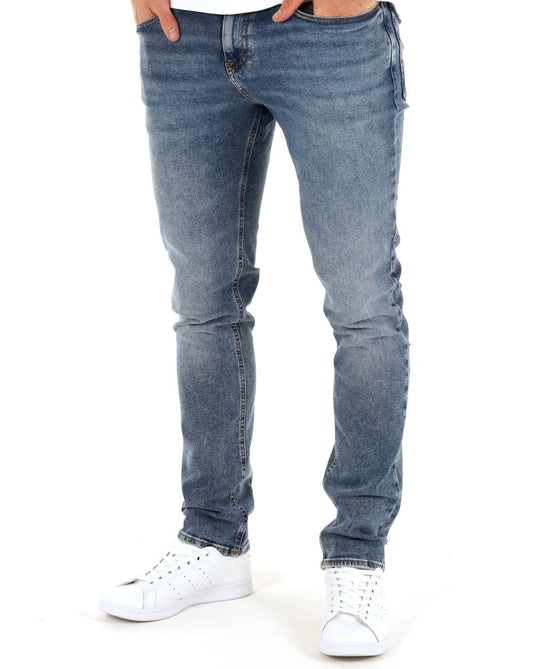 Tommy Jeans – Scanton – Schmal geschnittene Jeans in mittlerer Waschung