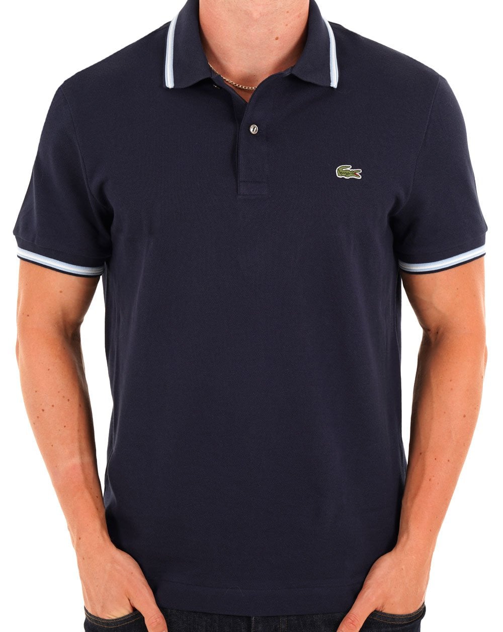 Lacoste – Poloshirt mit Streifen in Marineblau