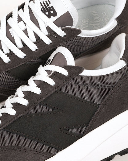 New Balance 370 Sneaker Schwarz Zement