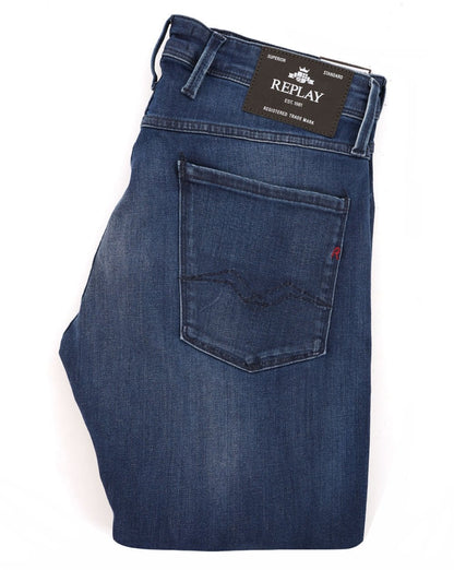 Replay – Anbass – Slim-Fit-Jeans in Dunkelblau mit verwaschenem Muster