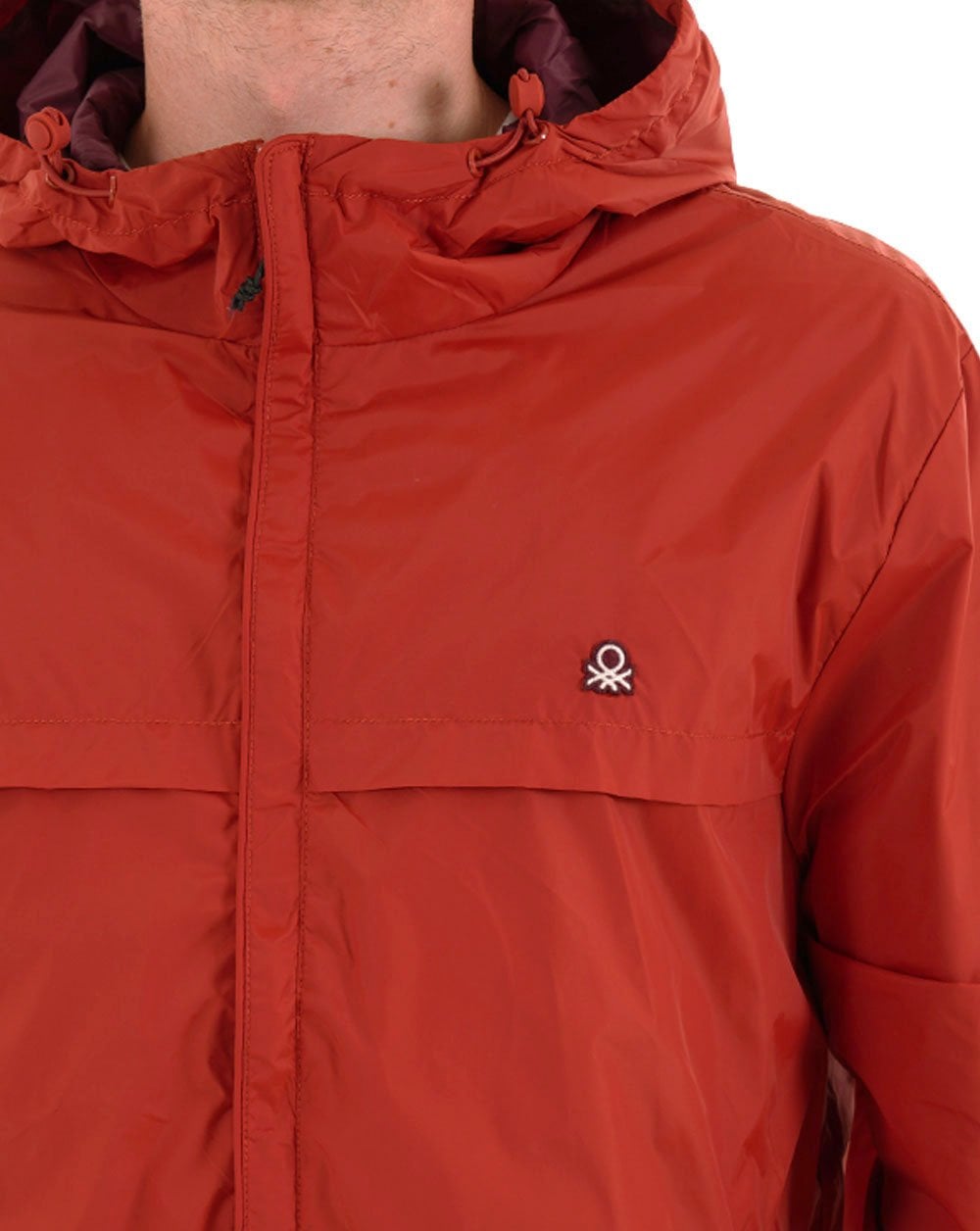 Benetton Regenjacke mit Kapuze Ziegelrot