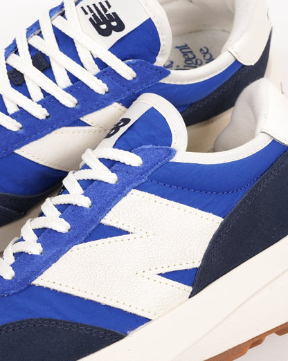 New Balance 370 Sneaker Blau/Meersalz