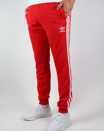 Adidas Originals Superstar Trainingshose mit Bündchen in Rot
