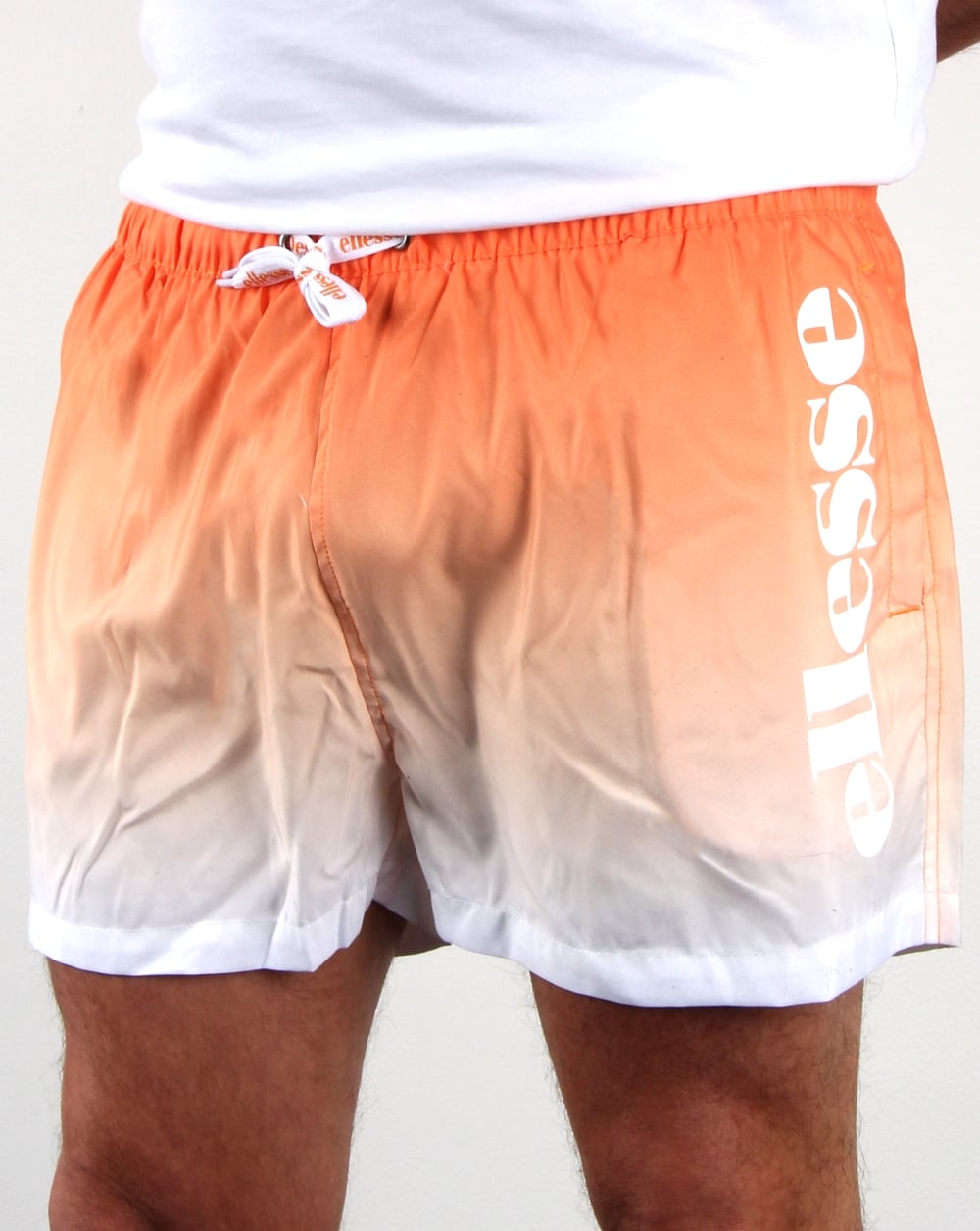 Ellesse – Fade – Badeshorts in Orange
