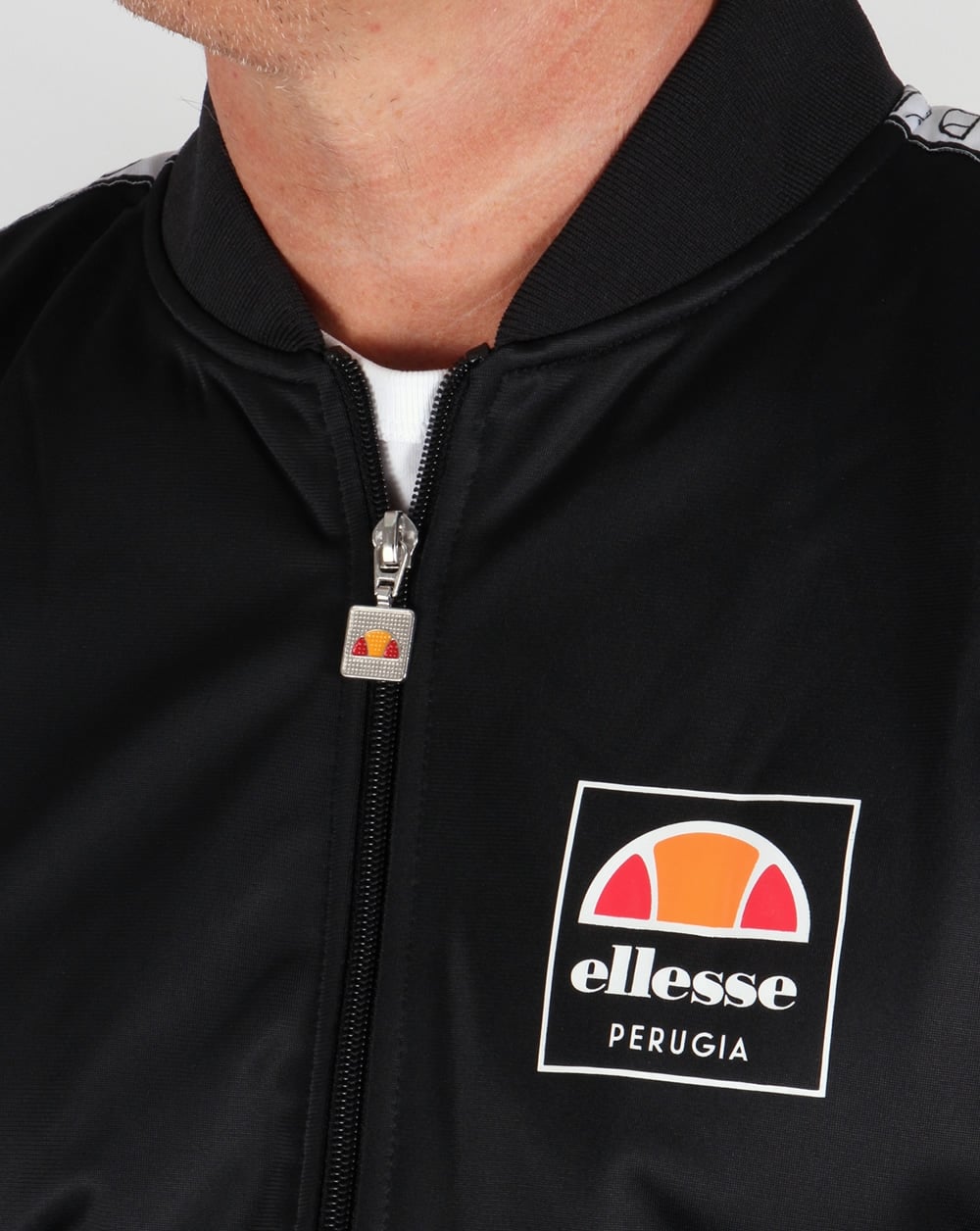 Ellesse – Jaynefi – Schwarzes Trainingsoberteil mit Zierband