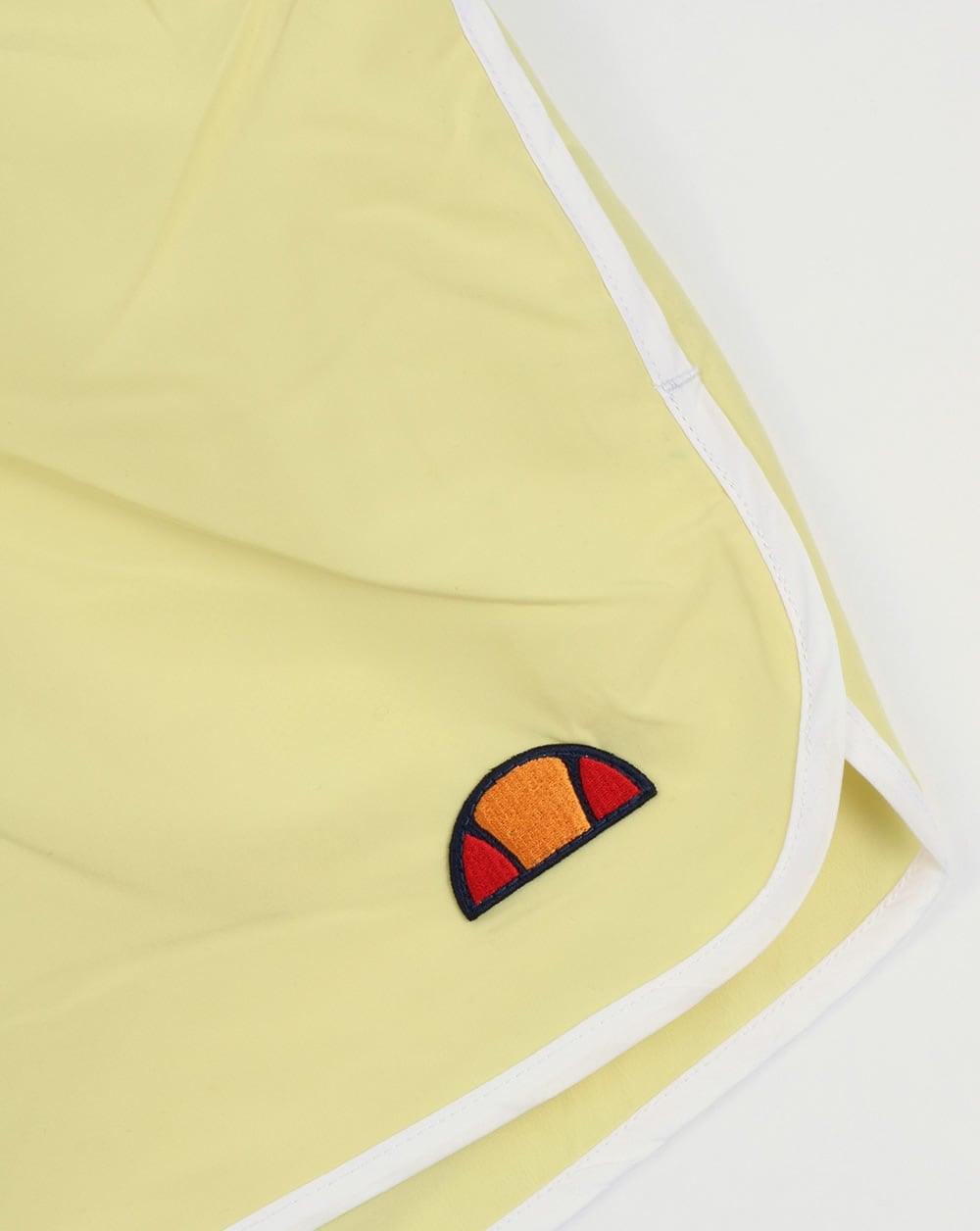 Ellesse – Nasello – Badeshorts in Gelb