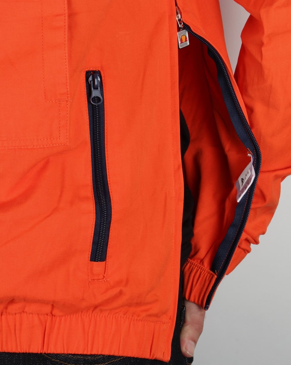 Ellesse – QTR – Smock-Jacke mit Reißverschluss in Orange